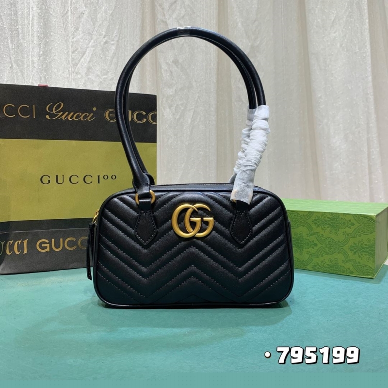 G*u*i top handle bags